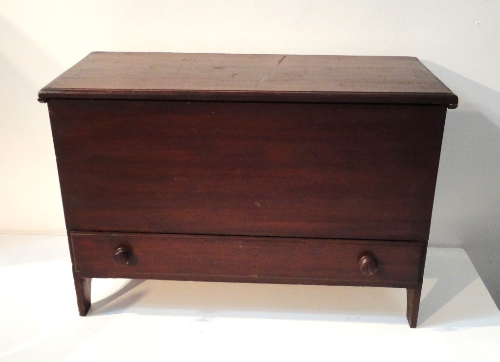 This early old natural stain finish has all the original hardware and wood drawer pulls. The wonderful simple shaker like style tall chest is in good condition. The inside strap hinges are also all original. The entire chest is made from handmade