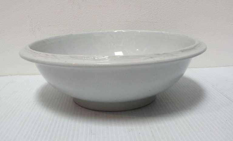 This large snow white English ironstone basin or serving bowl is in mint condition. This large bowl is great for fruit in a center of a table or large serving bowl.