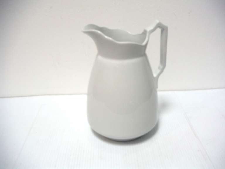 Early signed England Ironstone water pitcher in great condition. Great as display or for flowers on a table.