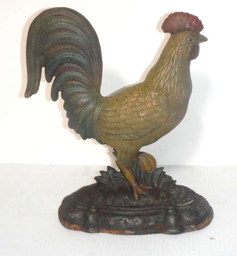 Amazing form & original painted surface cast iron Bradley & Hubbard rooster door stop .The surface is amazing and condition is very good.