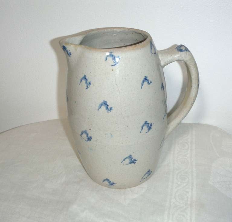 This is a very early spotted design spongeware water pitcher from a private collection in Pennsylvania. The condition is good and most unusual form.