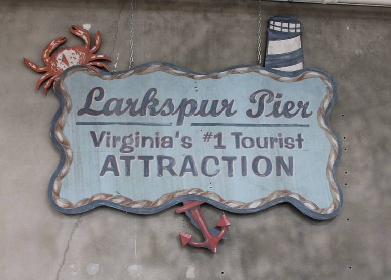 This very large oversize original hand-painted trade sign is from The Virginia's Larkspur Pier. This was a group of restaurants and retail stores. Very good condition with minor wear on the outside border. Great as a fun sign in a nautical setting