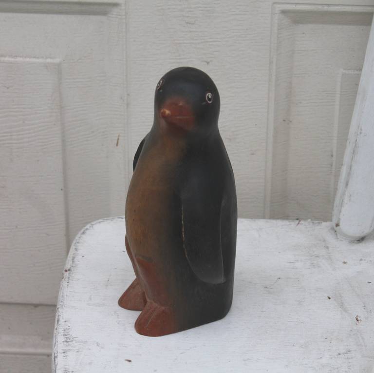 This fantastic original painted penguin is hand-carved out of one piece of wood. The condition is very good with the best surface. Was found in the state of Maine.