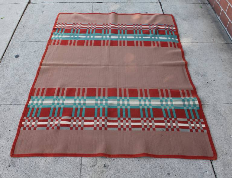 Fantastic colors in this wool horse blanket with the original bittersweet binding and in good condition. Minor moth bites wear but to be expected with a blanket of this age. This early 20th century blanket is in exceptional colors and pattern. This