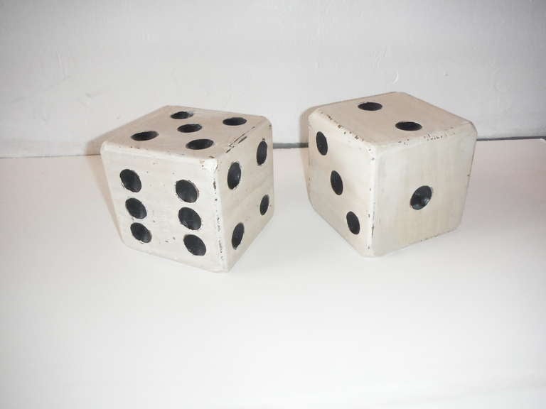 This pair of monumental wood carved and original painted black & white dice are in good condition .Minor wear on edges from use or age.