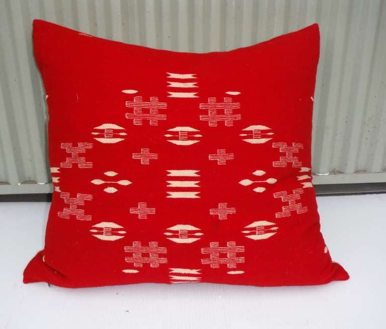 Fantastic large hand woven red and white Mexican Indian weaving large pillow with a beige cotton linen backing. Insert is down and feather fill with a zipper closure. This is in amazing condition and is a very early weaving. There is only one in