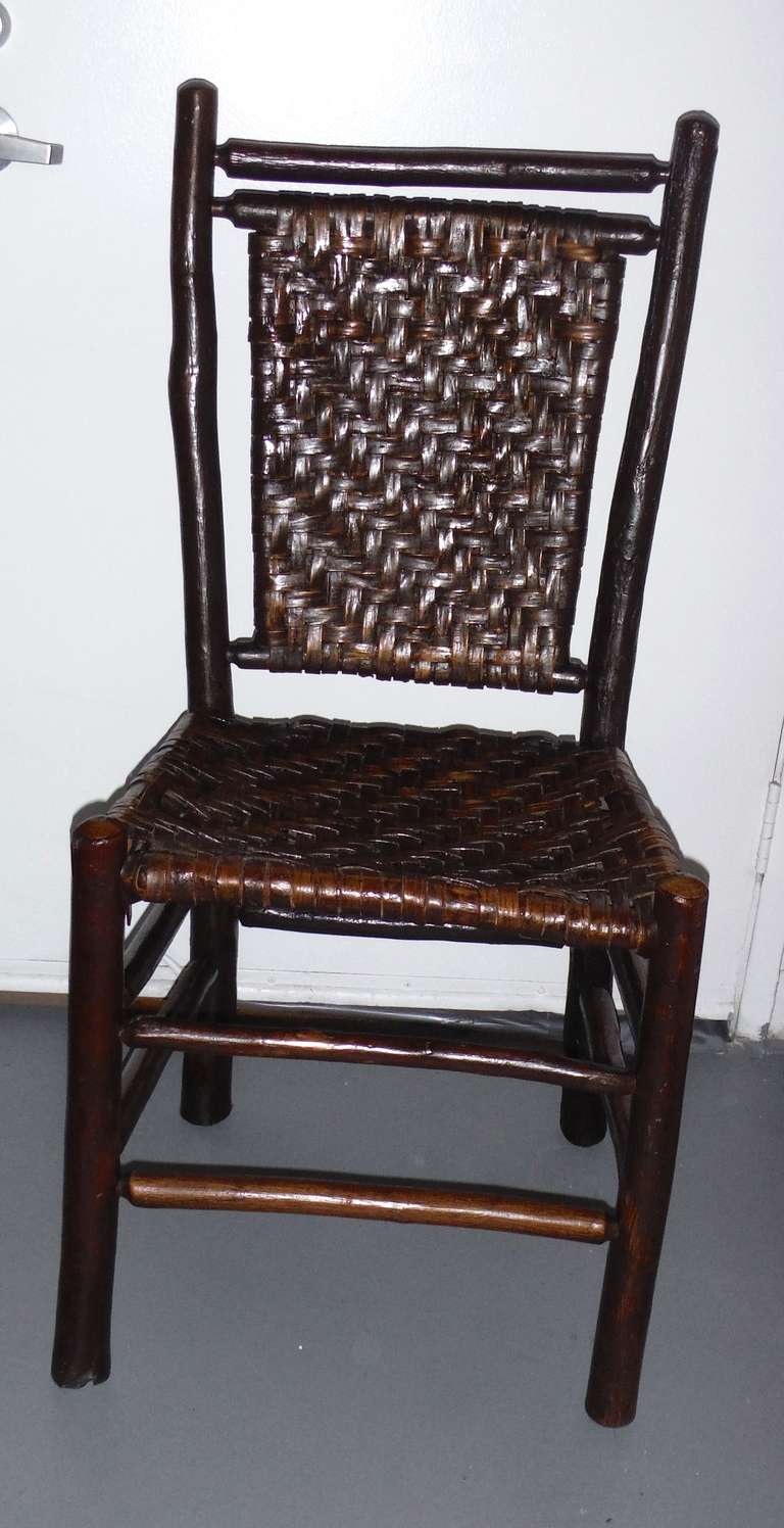 This is a amazing signed Old Hickory Furniture Company, Martinsville, Indiana.  Side or desk chair in great as found condition.  This chair has the original hand woven seat and back.  The patina is the very best.