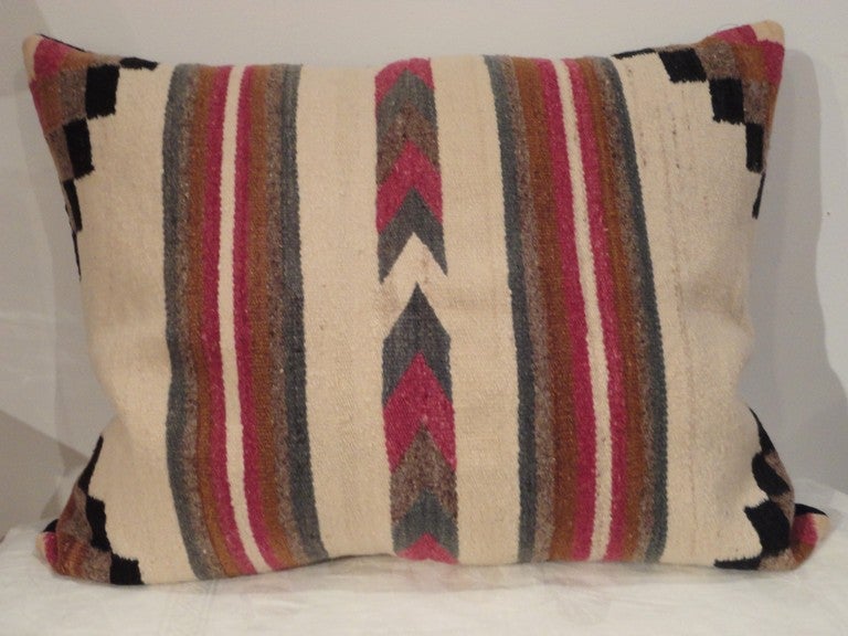 The colors in this saddle blanket weaving are vivid yet simple and almost modern.These colors are quite rare to see in the Navajo weaving's .This is in mint condition and has a black cotton linen backing.