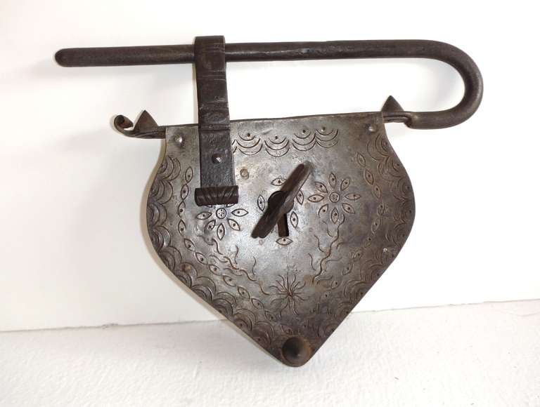 This large or oversize hand decorated and hand forged heart shaped wall or door lock has the original key and is in great condition. Great early hand made folk art for a wall or just in a early house . The detail and patina is the very best . Was