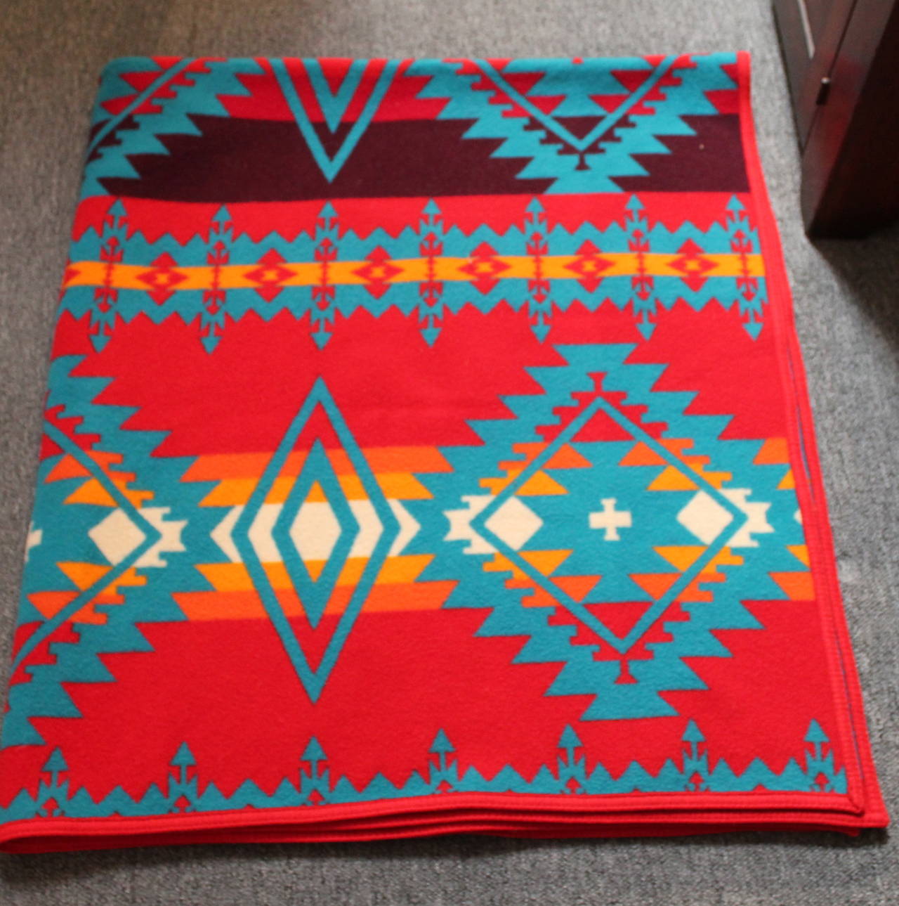 This Pendleton or Beaver State wool camp blanket is in great condition and has wonderful vibrant colors. It retains the original label. This is a full or queen size.