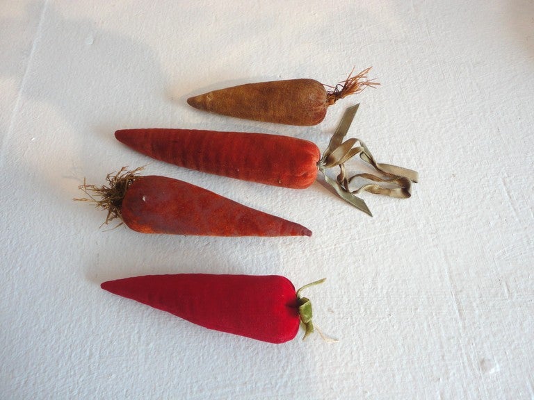 Fantastic collection of 14 pieces of 19th & early 20thc velvet fruit & vegetables.This wonderful collection is in great condition with minor wear on the earlier pieces.The collection consists of one banana ,four carrots,one peach,one mauve