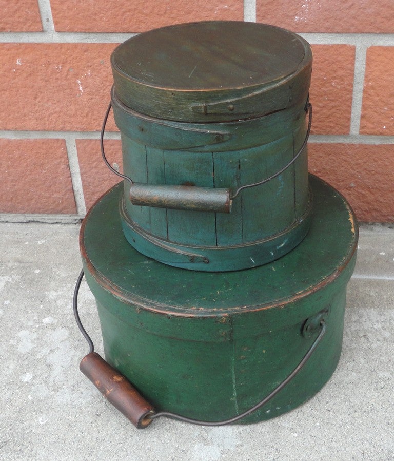 19THC Original green painted pantry box and sugar bucket from New England.Sold as a pair or individually  .They look great as a pair.The condition of both pieces are mint.Both pieces are early and have the original copper nails.The wire handles are