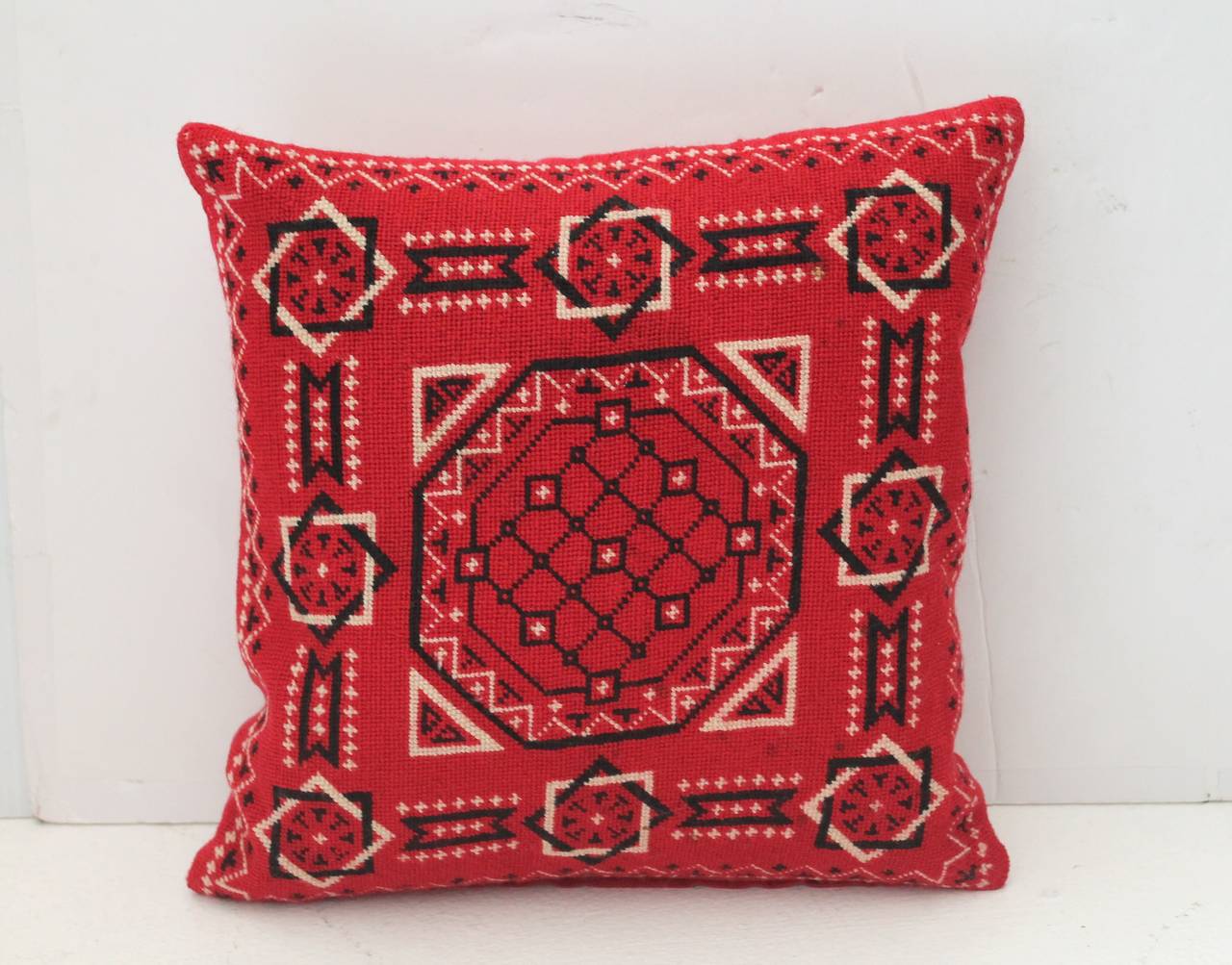 This amazing handwoven bandana is in great condition and has been made into a great one of a kind pillow. The backing is in a red cotton linen. The insert is down and feather fill.