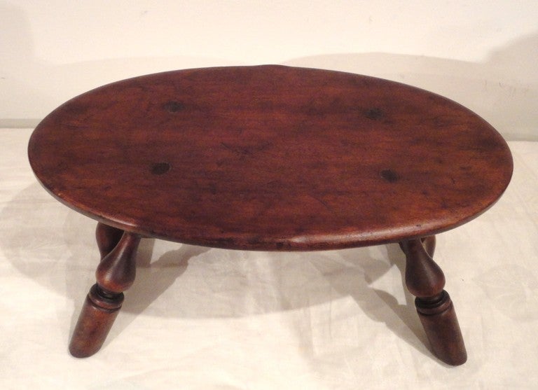 19thc signed by the maker, Paine Furniture Boston, Mass. Windsor foot stool in original old surface. The condition is very good. This is a great addition to any Americana collection.