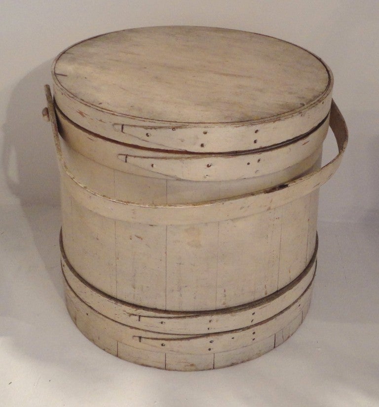 Collection of three original cream painted 19thc buckets from New England.This group in this photo are sold as a collection of three buckets.The condition are very good and all have original copper nails.