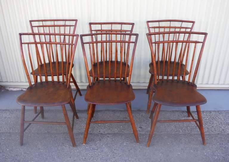 This set of 19th c. early Philadelphia Rod Back Birdcage Windsor Chairs is in outstanding condition with rich character and patina.  The chairs show bamboo-style turnings, typical of the Chinese influences of the mid 19th century.  

As seen in