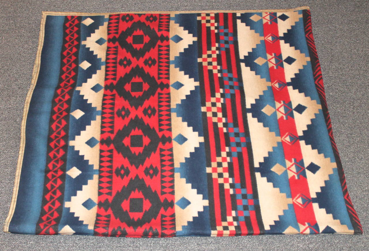 This is such a great and most unusual colors Indian design cotton blanket. It has wonderful geometric pattern and fantastic colors. The condition is pristine with minor wear on the original binding edge. Body of blanket is pristine.