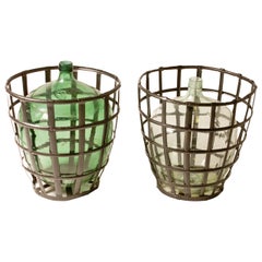1900 French Metal Baskets with Bottles in Clear and Green Glass