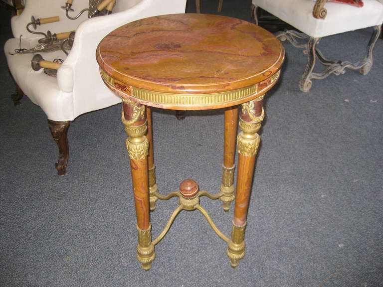 Unusual French marble table with marble legs and top mounted in metal