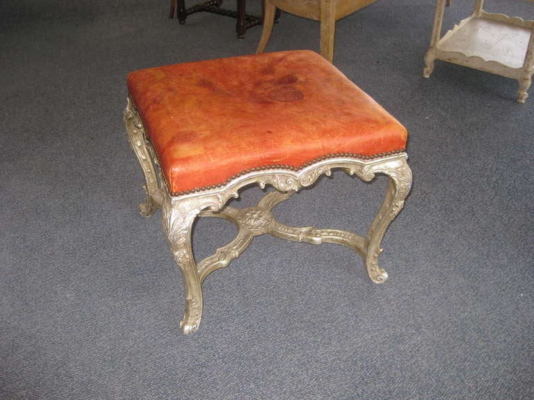 20th Century Distressed Red Leather Regence Style Ottoman For Sale