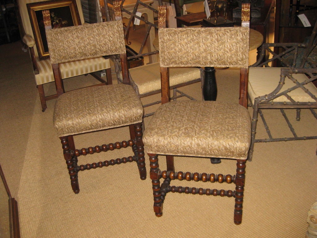 Great looking pair of English style turned side chairs with fortuny textiles and gilt wood