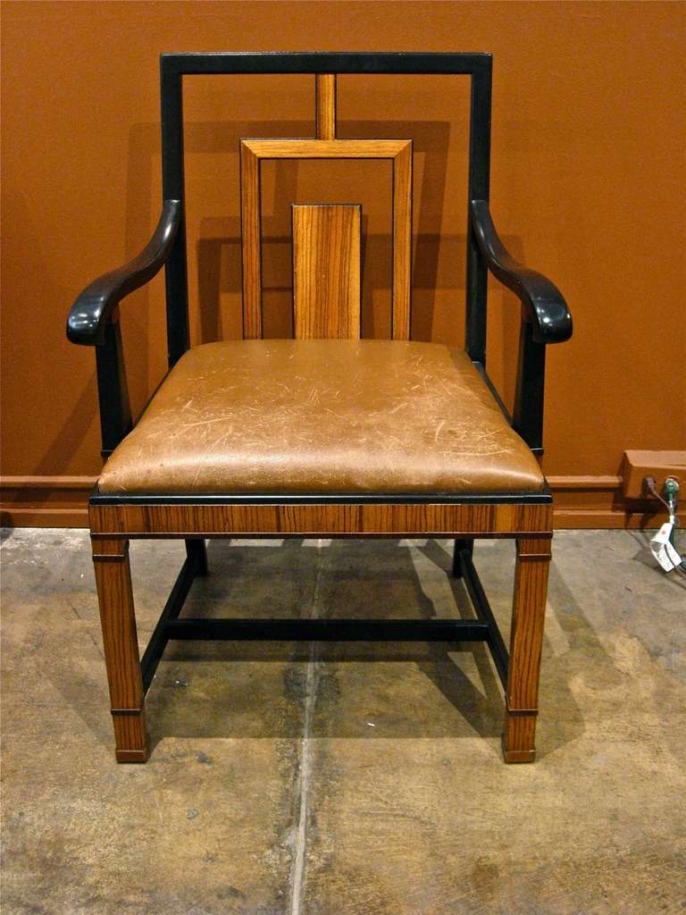 Rare art deco armchair in Chinese style by Swedish modernist Gustav Bergstrom (1899-1981). Crafted in rosewood and ebonized birch wood. 
Seat covered in brown leather. Restored.

The price listed is the FINAL NET price, which reflects a 50%