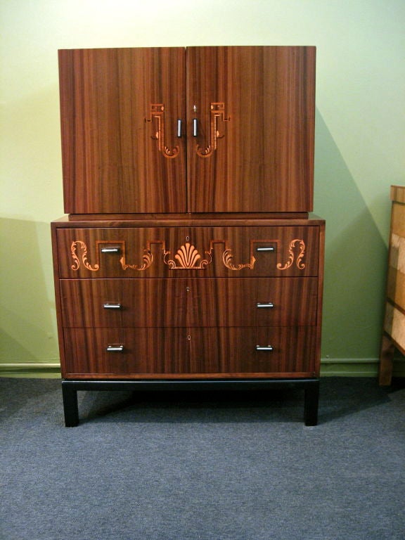 Swedish art deco era inlaid secretaire/chest of drawers in walnut, rosewood, ebony and birch woods. Interior in golden flame birch and walnut. Original metal and bakelite pulls. The perfect, compact work/storage solution.  Made at Svenska