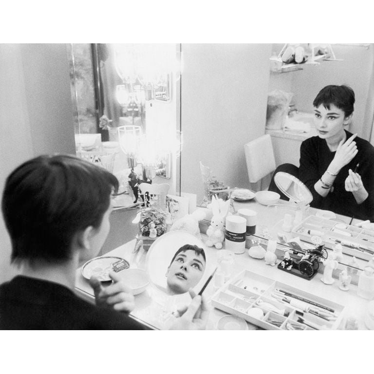 Captured by Mark Shaw for a LIFE magazine article in 1953 is a portrait of Audrey Hepburn on the set of 