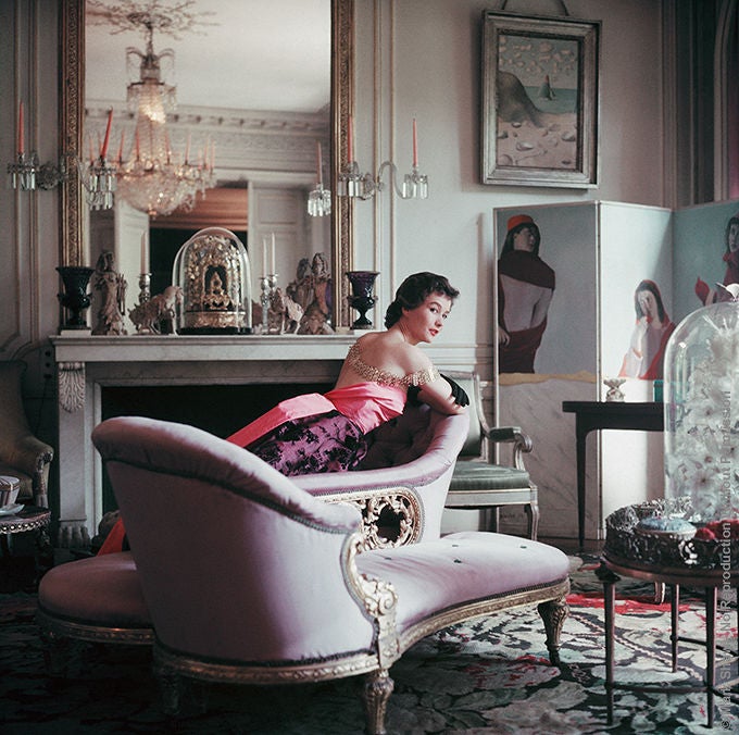 Captured here in the by legendary Kennedy Family/Fashion photographer Mark Shaw is model Chislaine de Bosisson in the Paris home of Elsa Schiaparelli in 1953. Mark Shaw photographed  de Bosisson (Schiaparelli's most famous model)in an ankle-length