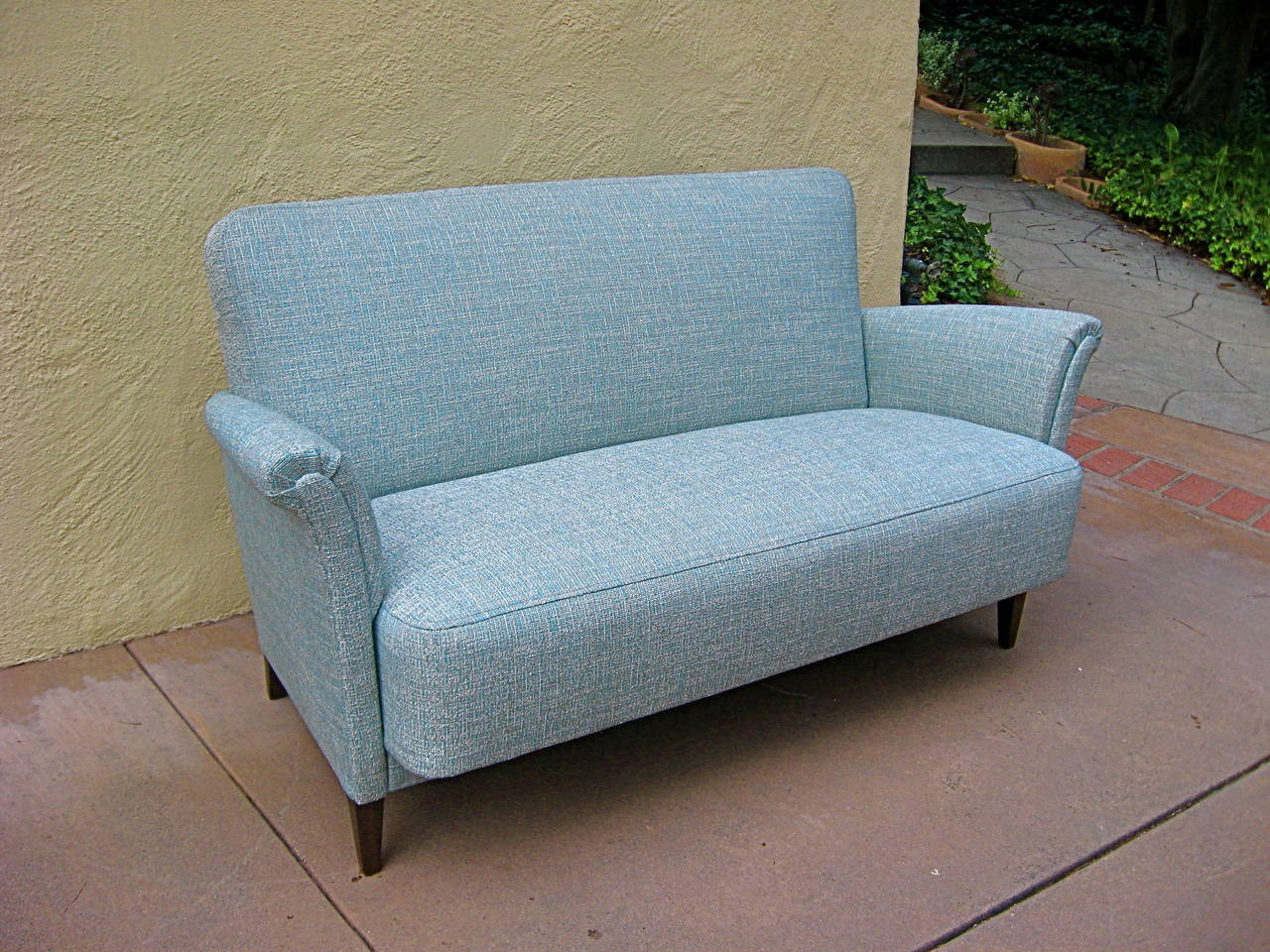 Swedish Mid-Century Modern loveseat or sofa with solid birch wood frame. Completely restored and reupholstered in light blue tweed.