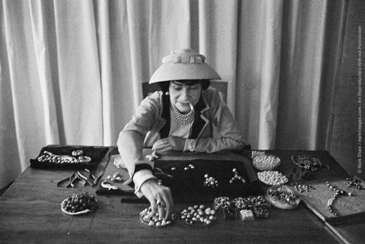Coco Chanel concocting jewelery in her Paris atelier as captured by Mark Shaw for LIFE Magazine in 1957.
Chanel was quoted at the time as saying that 