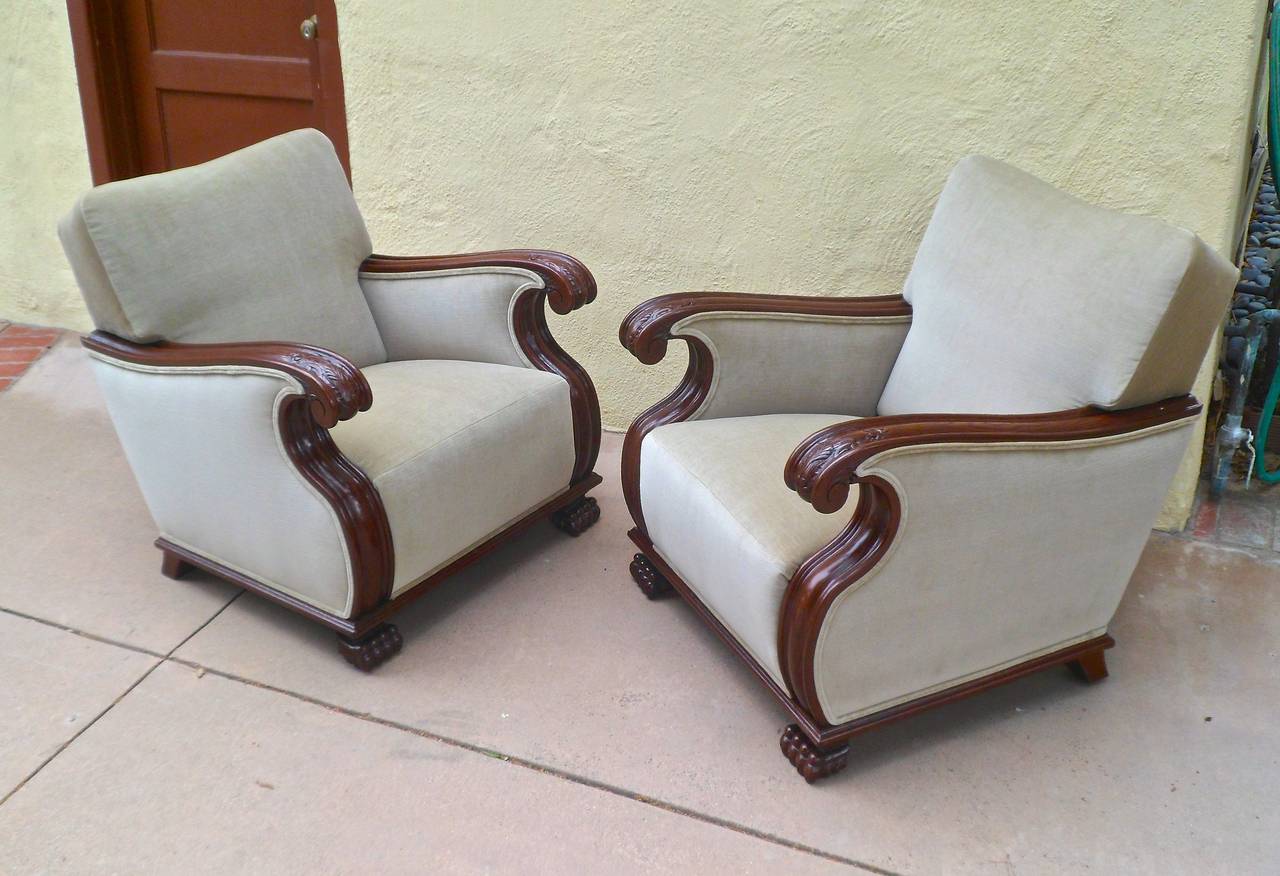 Pair of Swedish 1940s Gothic Revival armchairs. Wood in oak. Hand-carved details on scrolled arm. Carved animal feet. Solid wood frame. Completely restored and freshly reupholstered in taupe velvet.

 The price listed is the final net price, which
