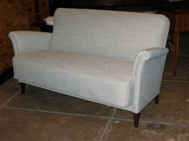 Swedish mid-century modern settee (two seater) with solid birch wood frame. Completely restored and reupholstered in powder blue tweed. 

The price listed is the FINAL NET price, which reflects a 50% reduction-extended through the Svenska Mobler