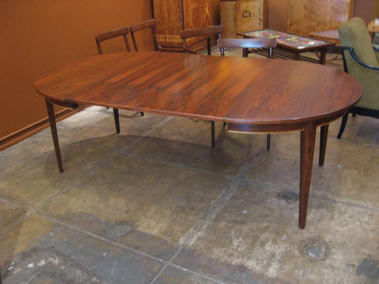 Extendible Danish Mid-Century Modern Rosewood Dining Table with Two Leaves In Excellent Condition In Richmond, VA