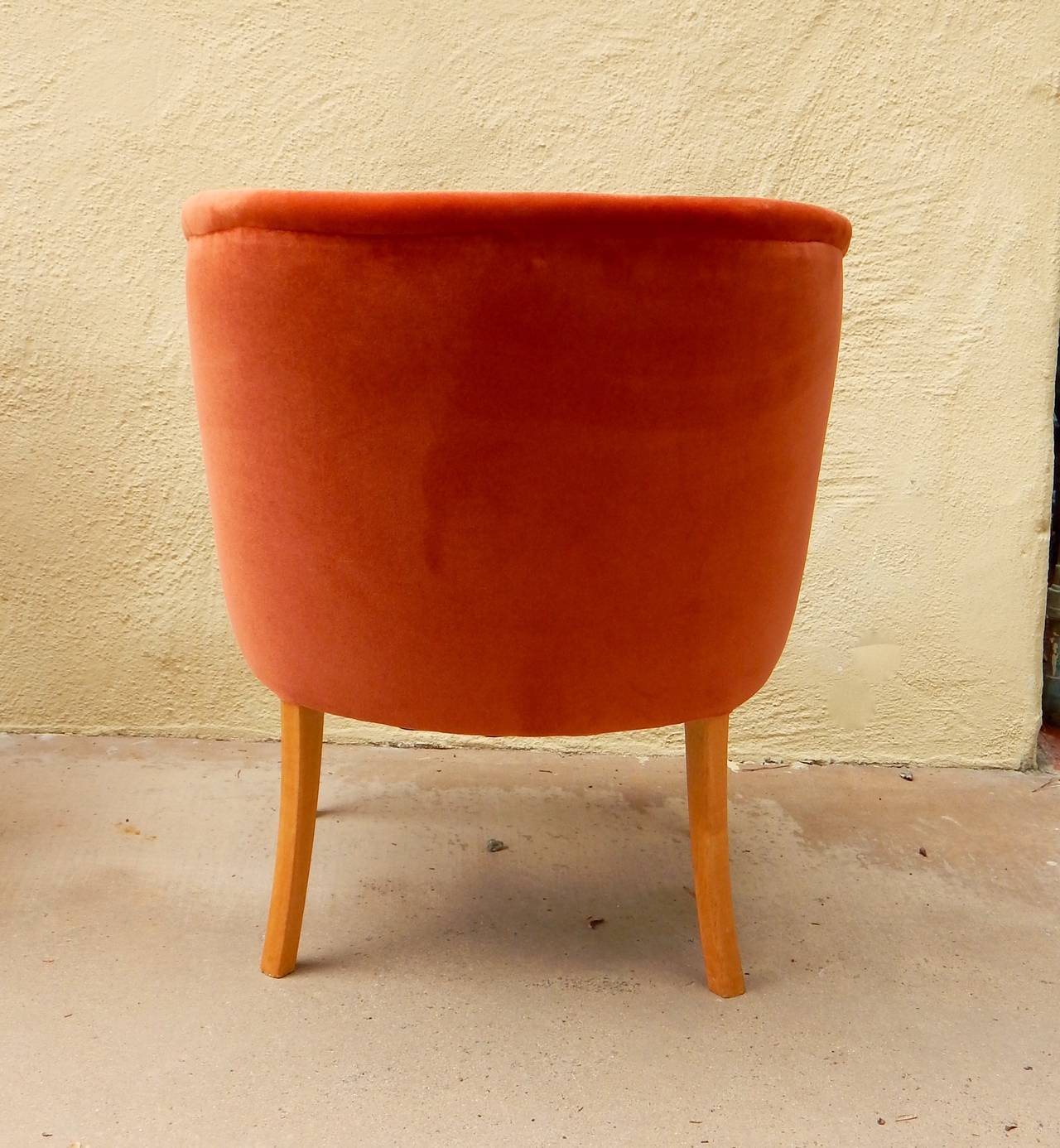 Pair of Swedish  upholstered chairs designed by Carl Malmsten for OH Sjögren in Tranås, Sweden ca. 1950. Solid birch under fabric. Legs in golden flame birchwood. Restored and upholstered in burnt orange velvet. 