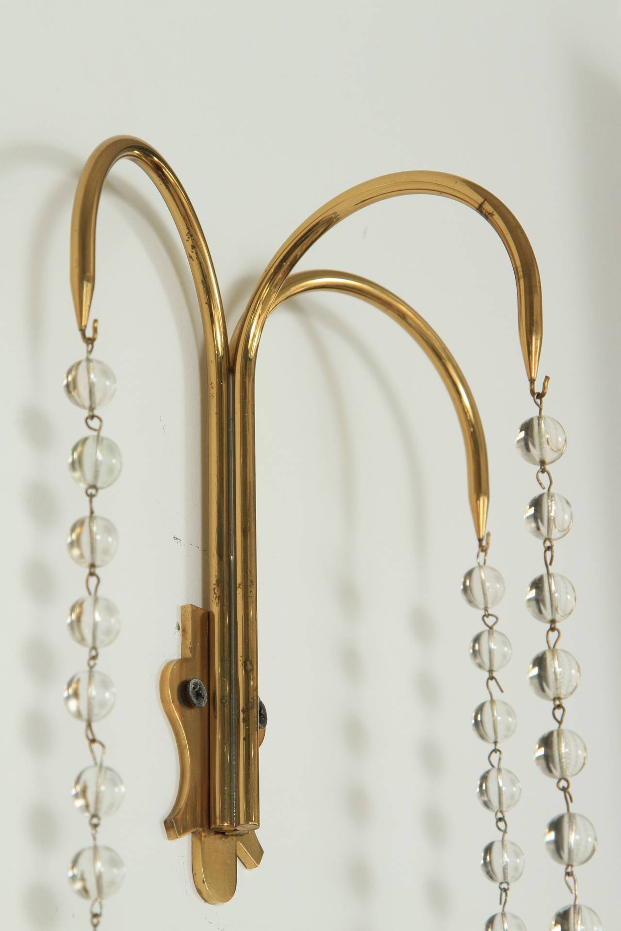 Mid-Century Modern Two Pairs of Brass and Crystal Sconces by Tommi Parzinger