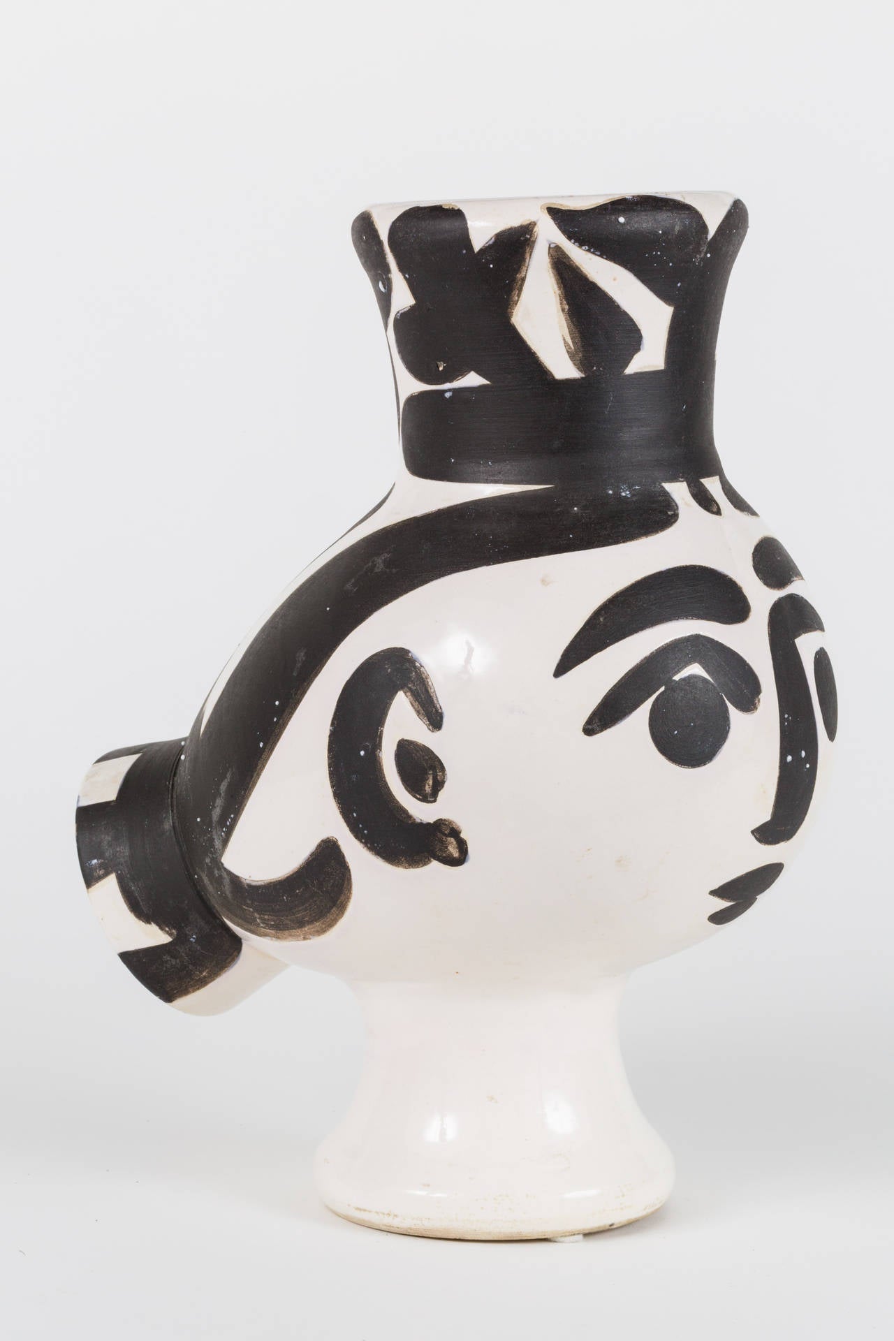 Exceptional white earthenware vase with enrollee and paraffin decoration, black with white enamel, 1951, from the edition of 500, with the 'Madoura PLEIN FEU' and 'EDITION PICASSO' pottery stamps on the underside, produced at Madoura Pottery