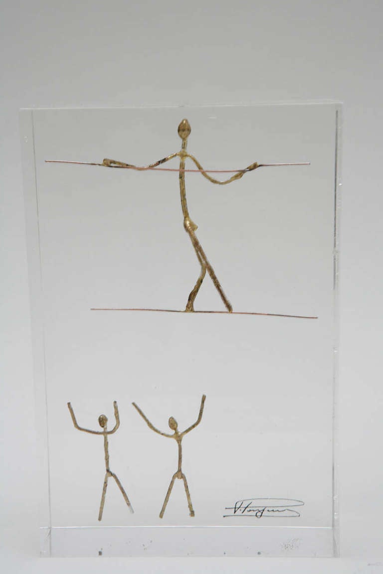 Pair of Bronze Figures Encased in Lucite Blocks