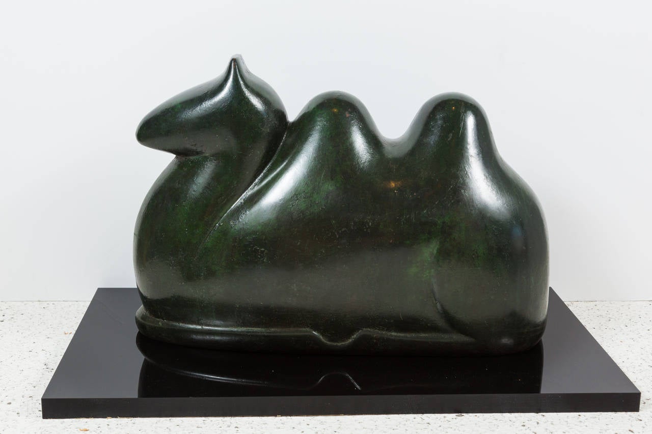 Incredible bronze camel sculpture that  has an incredibly rich patina. Sale includes signed 