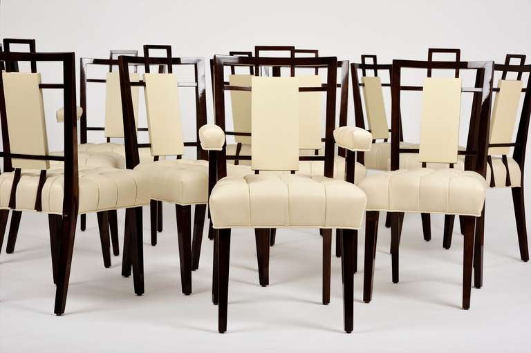 A superb set of ten leather upholstered dining chairs by William Haines that are identical to the dining chairs designed for the Brody residence. Two arm chairs and three side chairs are original and we fabricated an additional five side chairs to