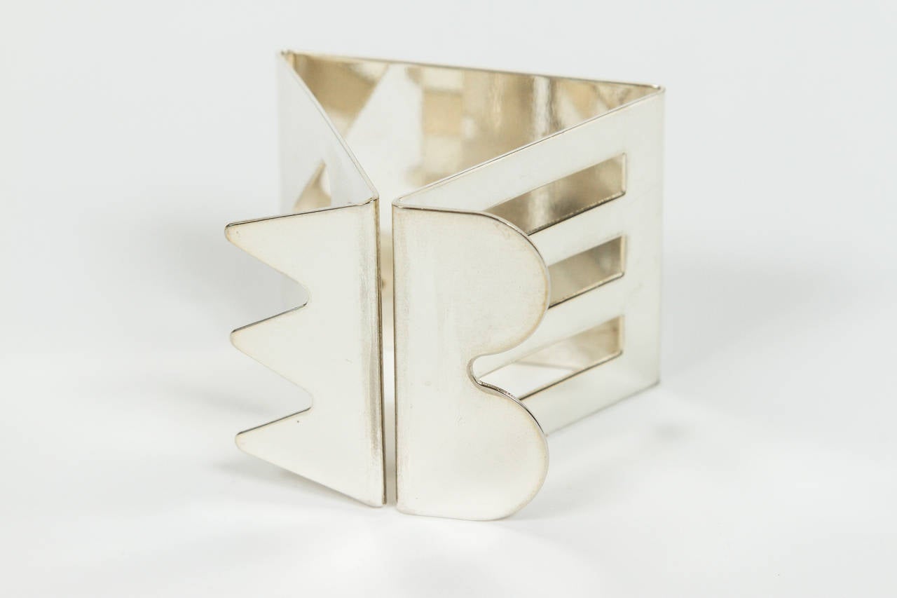 Eight silver plated napkin rings by one of renowned founders of The Memphis Group, Nathalie Du Pasquier and Ajumi Han, for Bodum of Switzerland. There are seven different designs in all and each holder is stamped on the interior: 