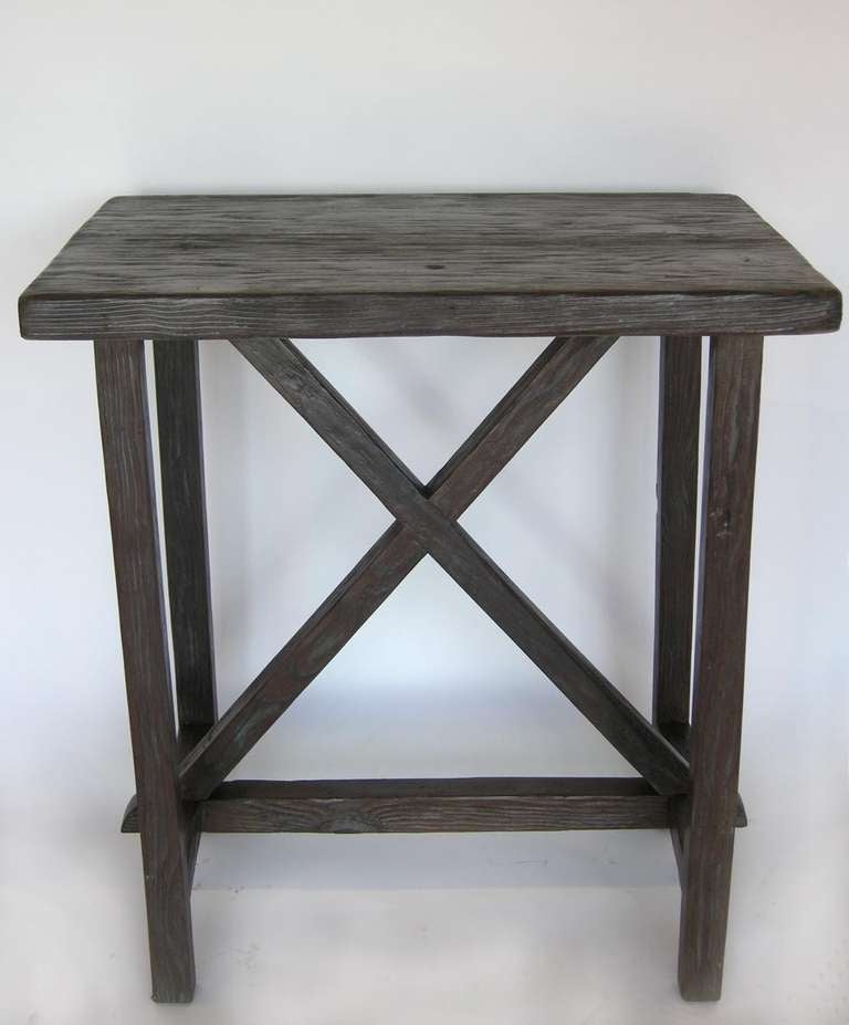 Reclaimed 100 year old Douglas fir side table with X stretcher. Can be made in any size and in a variety of finishes. Made in Los Angeles by Dos Gallos Studio.
