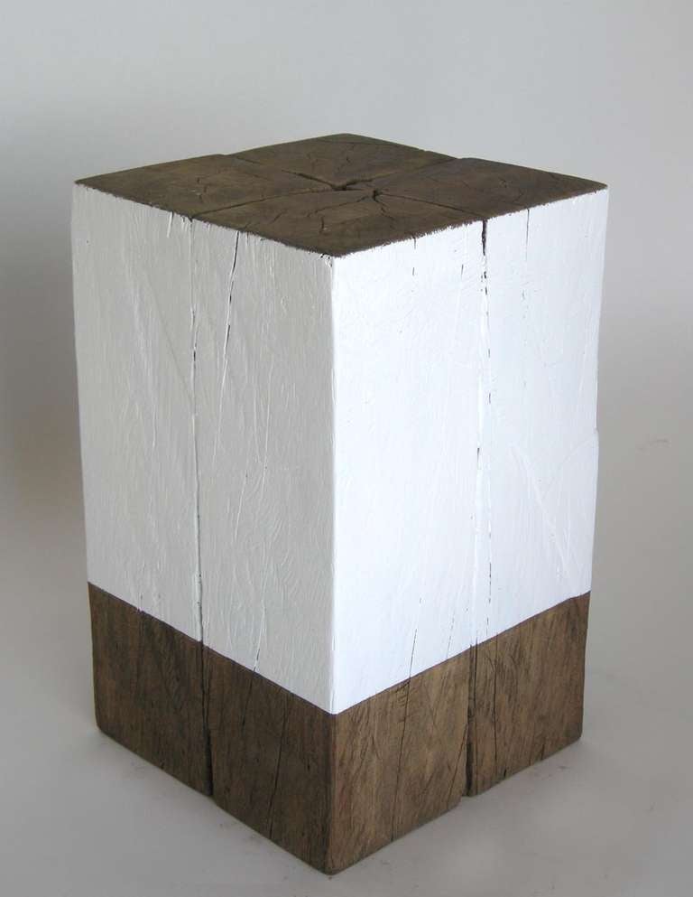 Side table or stool made from reclaimed wood. White stripe