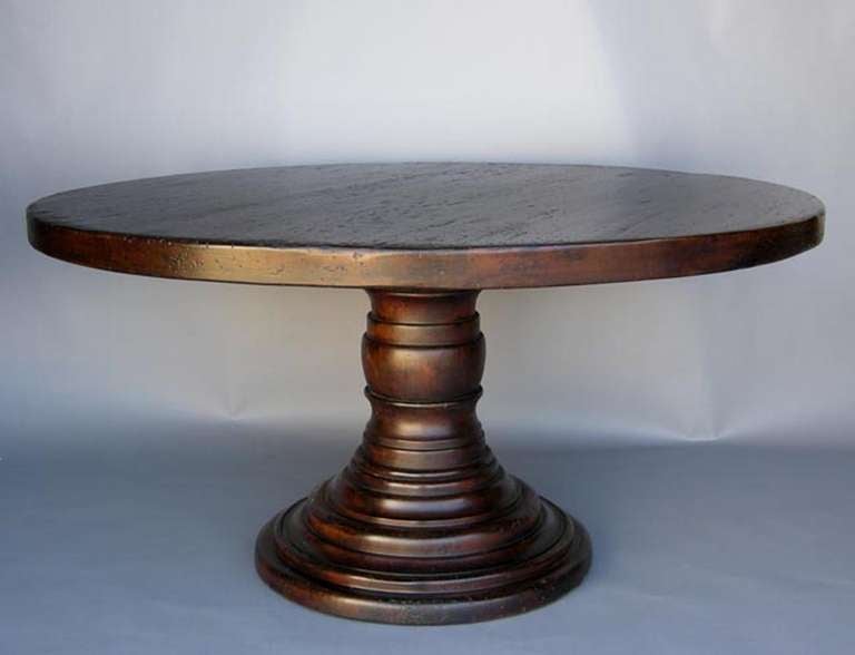 Custom pedestal table in dark mahogany with beehive base. Measure: Top is 2 1/2