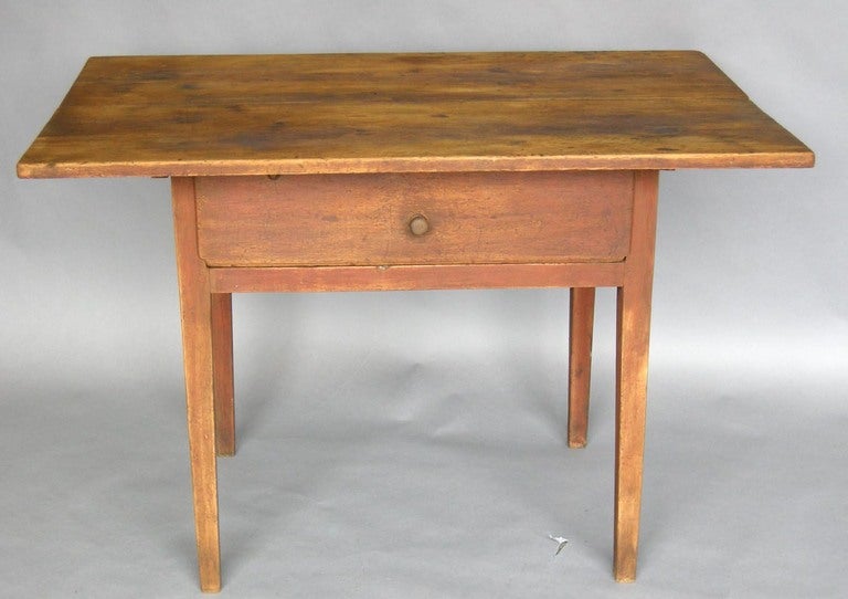 Circa 1810 Massachusetts Federal two-wide board top tavern table. Original oxblood pigment paint on body. Beautiful patina on top. 