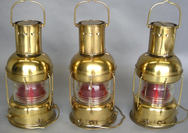 Three Japanese vintage nautical masthead lights.  They measure 10.75Dx21.5H each without handle. Can be electrified.