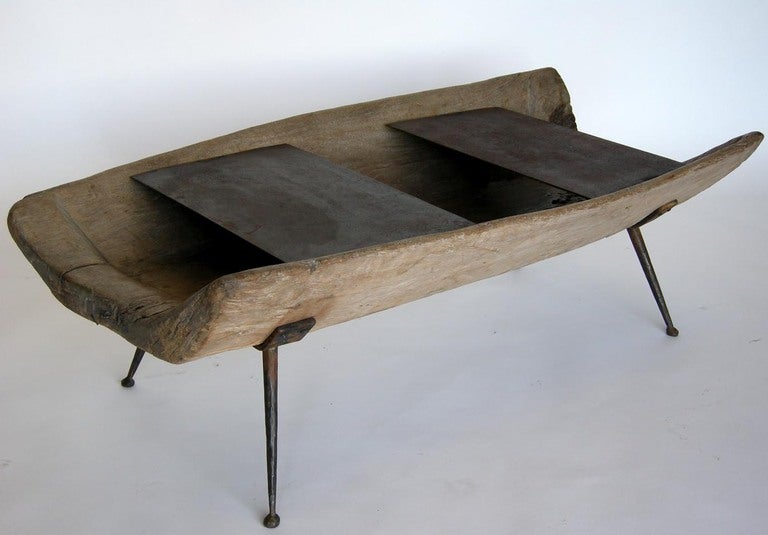 Spanish colonial wooden trough, batea,  coffee table with contemporary hand forged base and moveable trays. This wooden tray was used for preparing food and has a beautiful, natural, bleached patina.