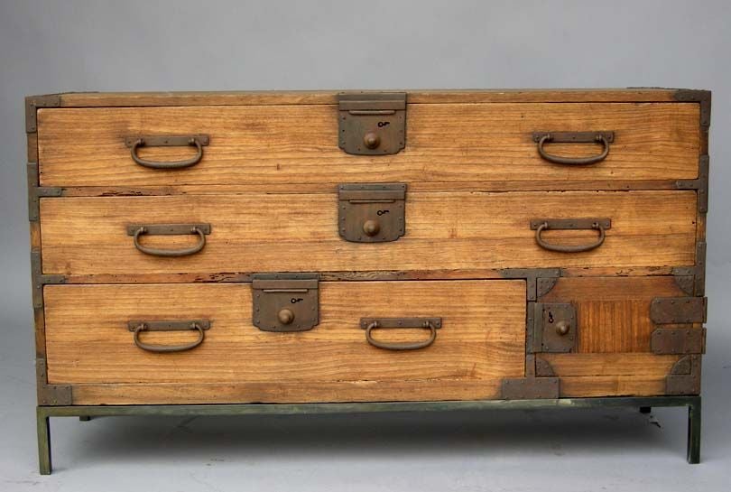 Antique Japanese sword chest on hand wrought iron base.