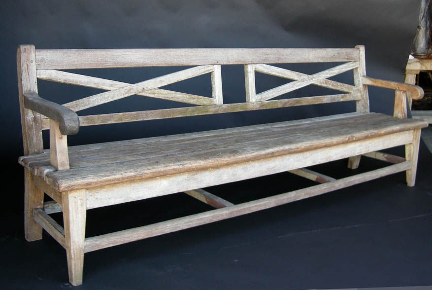 Antique bench in chicosapote wood, which is the same wood used in ancient Mayan temples. It has a beautiful grayish weathered patina with some remnants of old paint