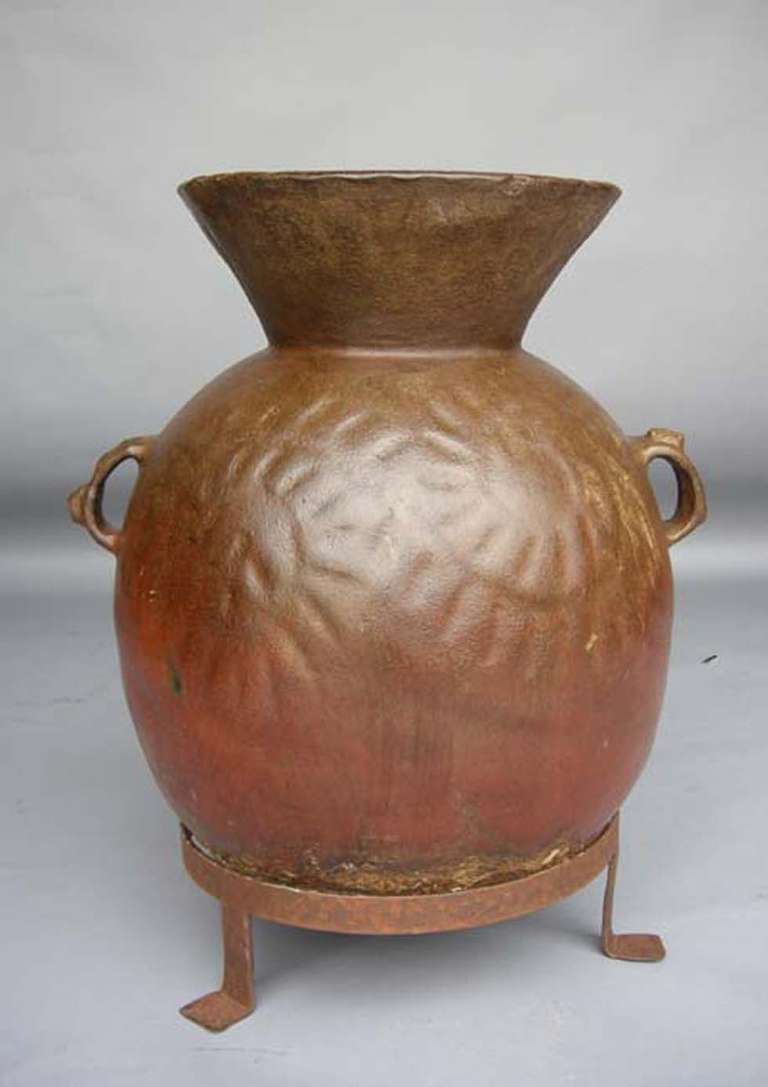 Antique ceramic florero, water storage pot,  with beautiful reversed relief motif.
23Dx26H with stand